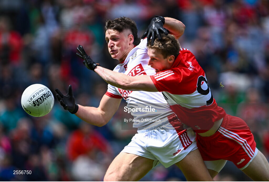 2 July 2023; Colm O'Callaghan of Cork in action against Brendan Rogers of Derry during the GAA Football All-Ireland Senior Championship quarter-final match between Derry and Cork at Croke Park in Dublin. Photo by Piaras Ó Mídheach/Sportsfile