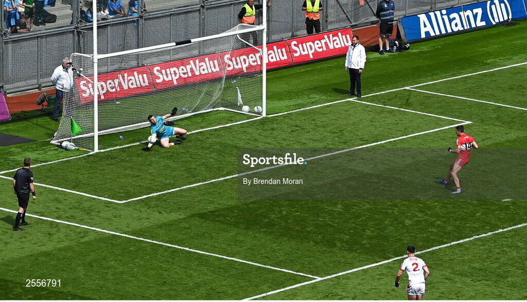 2 July 2023; Cork goalkeeper Míchéal Aodh Martin saves a penalty from Shane McGuigan of Derry during the GAA Football All-Ireland Senior Championship quarter-final match between Derry and Cork at Croke Park in Dublin. Photo by Brendan Moran/Sportsfile