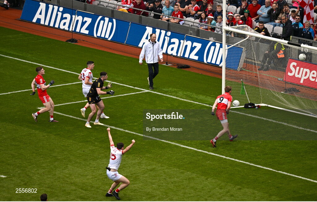 2 July 2023; Rory Maguire of Cork scores his side's first goal over Dublin goalkeeper Stephen Cluxton during the GAA Football All-Ireland Senior Championship quarter-final match between Derry and Cork at Croke Park in Dublin. Photo by Brendan Moran/Sportsfile