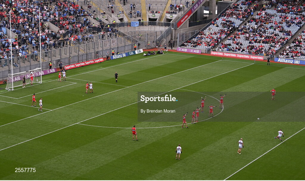 2 July 2023; Steven Sherlock of Cork takes a 45 as the Derry defence defend during the GAA Football All-Ireland Senior Championship quarter-final match between Derry and Cork at Croke Park in Dublin. Photo by Brendan Moran/Sportsfile