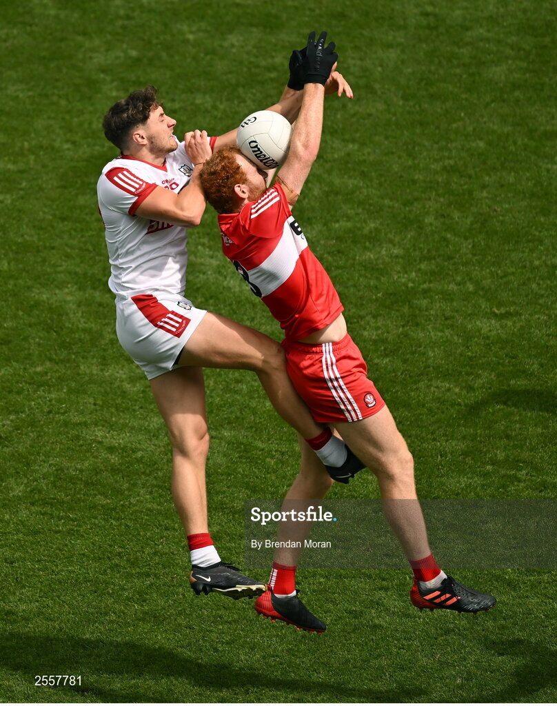 2 July 2023; Paul Walsh of Cork, left, and Conor Glass of Derry contest a kickout during the GAA Football All-Ireland Senior Championship quarter-final match between Derry and Cork at Croke Park in Dublin. Photo by Brendan Moran/Sportsfile