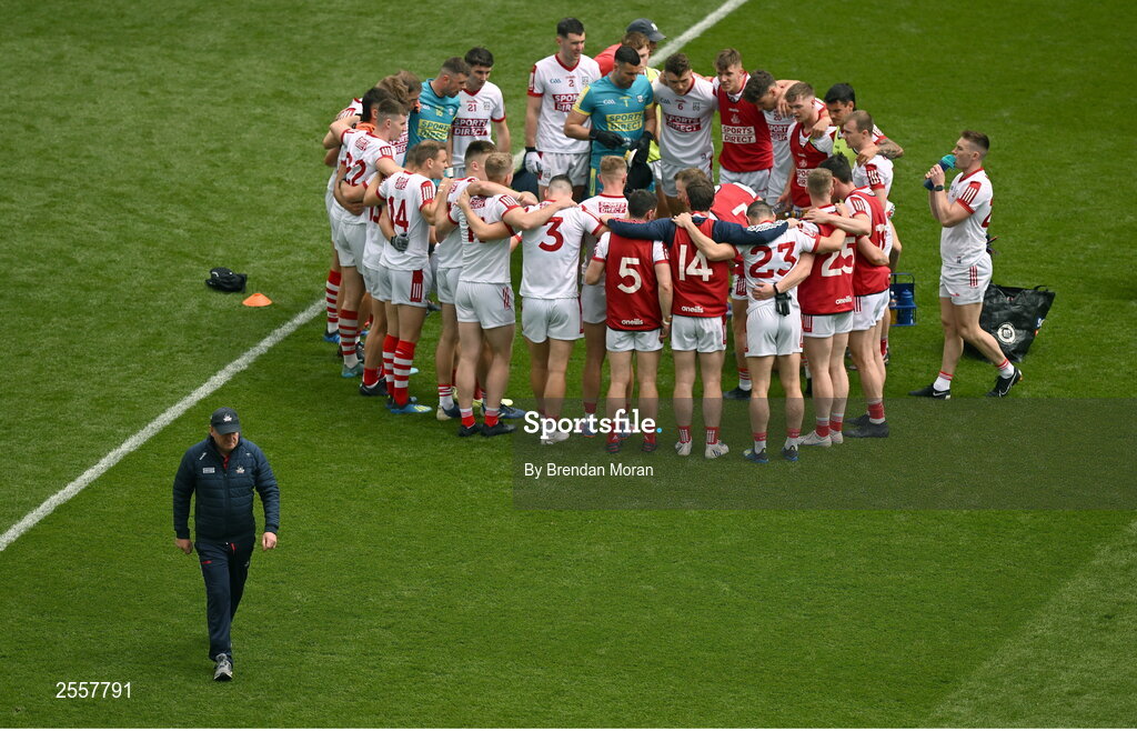 2 July 2023; Cork manager John Cleary walks away as his team huddle before the GAA Football All-Ireland Senior Championship quarter-final match between Derry and Cork at Croke Park in Dublin. Photo by Brendan Moran/Sportsfile