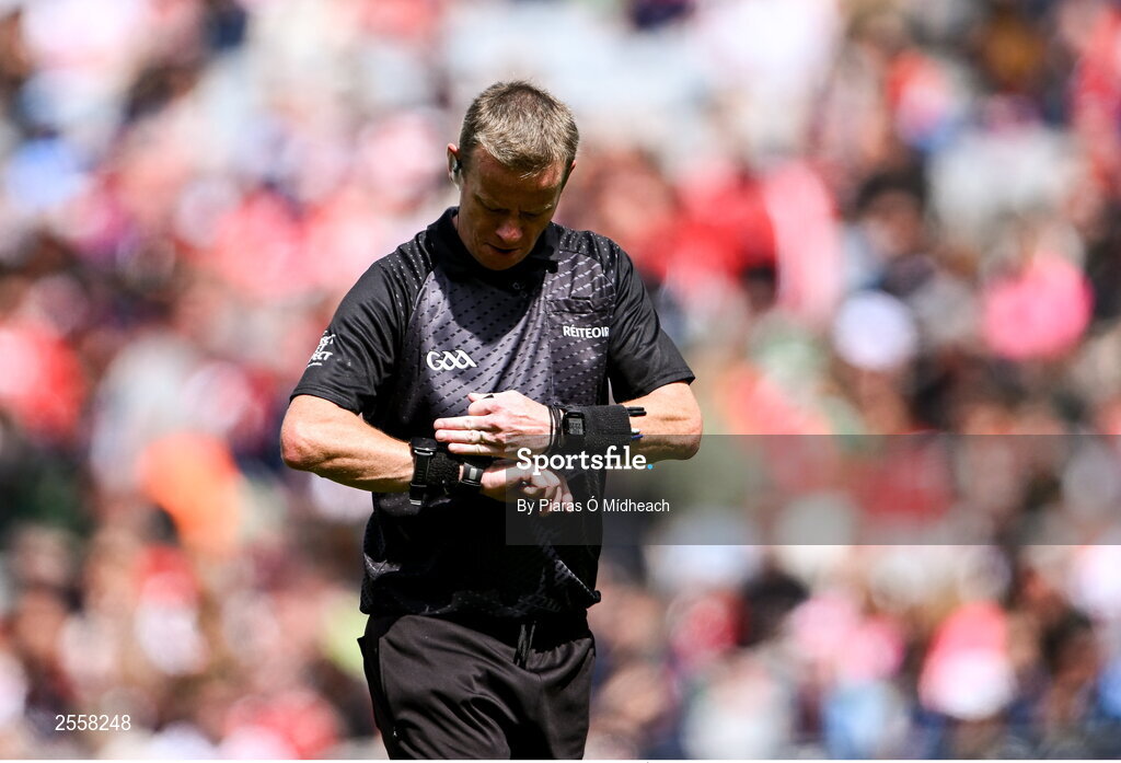2 July 2023; Referee Joe McQuillan checks his watch during the GAA Football All-Ireland Senior Championship quarter-final match between Derry and Cork at Croke Park in Dublin. Photo by Piaras Ó Mídheach/Sportsfile