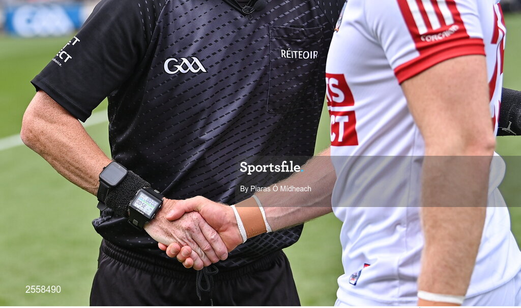 2 July 2023; Referee Joe McQuillan shakes hands with Cork captain Brian Hurley before the GAA Football All-Ireland Senior Championship quarter-final match between Derry and Cork at Croke Park in Dublin. Photo by Piaras Ó Mídheach/Sportsfile