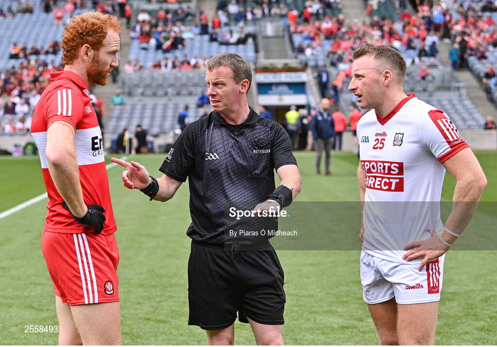 2 July 2023; Referee Joe McQuillan with team captains Conor Glass of Derry and Brian Hurley of Cork for the coin toss before the GAA Football All-Ireland Senior Championship quarter-final match between Derry and Cork at Croke Park in Dublin. Photo by Piaras Ó Mídheach/Sportsfile