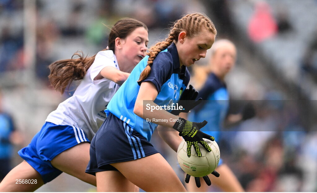 15 July 2023; Chloe Carey, Lisnagry NS, Lisnagry, Limerick, representing Dublin, and Aoife Rodgers, St Brigid's NS, Bailieborough, Cavan, representing Monaghan, during the INTO Cumann na mBunscol GAA Respect Exhibition Go Games at the GAA Football All-Ireland Senior Championship semi-final match between Dublin and Monaghan at Croke Park in Dublin. Photo by Ramsey Cardy/Sportsfile
