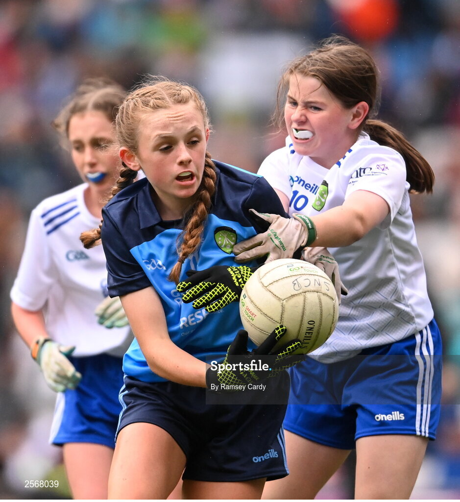 15 July 2023; Chloe Carey, Lisnagry NS, Lisnagry, Limerick, representing Dublin, and Lara McAleer, St. Mary's PS, Cabragh, Tyrone, representing Monaghan, during the INTO Cumann na mBunscol GAA Respect Exhibition Go Games at the GAA Football All-Ireland Senior Championship semi-final match between Dublin and Monaghan at Croke Park in Dublin. Photo by Ramsey Cardy/Sportsfile