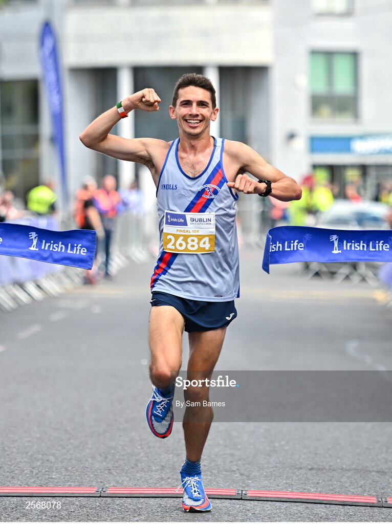 16 July 2023; Emmet Jennings of Dundrum South Dublin AC, crosses the line to win the 2023 Irish Life Dublin Race Series-Fingal 10km which took place on Sunday 16th of July at Swords in Dublin. Photo by Sam Barnes/Sportsfile