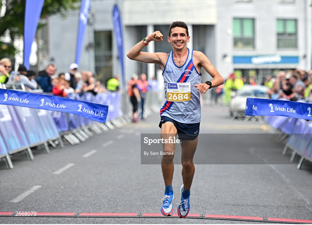 16 July 2023; Emmet Jennings of Dundrum South Dublin AC, crosses the line to win the 2023 Irish Life Dublin Race Series-Fingal 10km which took place on Sunday 16th of July at Swords in Dublin. Photo by Sam Barnes/Sportsfile