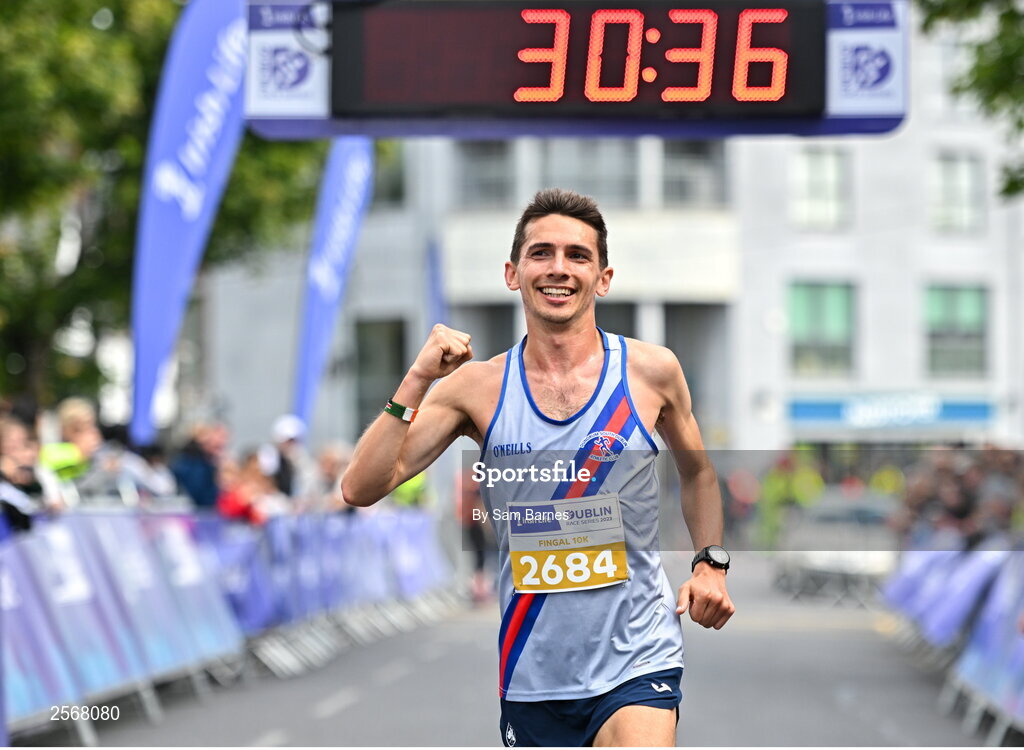 16 July 2023; Emmet Jennings of Dundrum South Dublin AC, crosses the line to win the 2023 Irish Life Dublin Race Series-Fingal 10km which took place on Sunday 16th of July at Swords in Dublin. Photo by Sam Barnes/Sportsfile