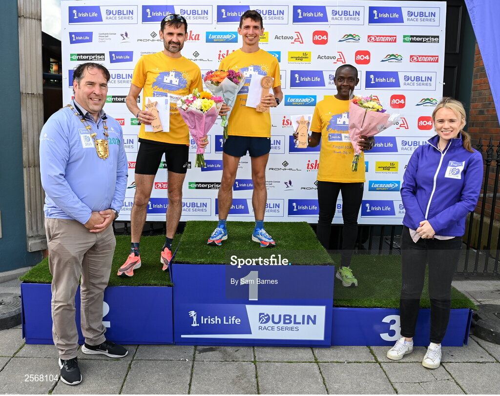 16 July 2023; The top three male finishers Emmet Jennings of Dundrum South Dublin AC, centre, first, Sergiu Ciobanu of Clonliffe Harriers AC, Dublin, second from left, second, and Peter Somba of Dunboyne AC, Wicklow, second from right,third, with Mayor of Fingal, Councillor Adrian Henchy, far left, and Sarah Judge, Irish Life, far right, after the 2023 Irish Life Dublin Race Series-Fingal 10km which took place on Sunday 16th of July at Swords in Dublin. Photo by Sam Barnes/Sportsfile