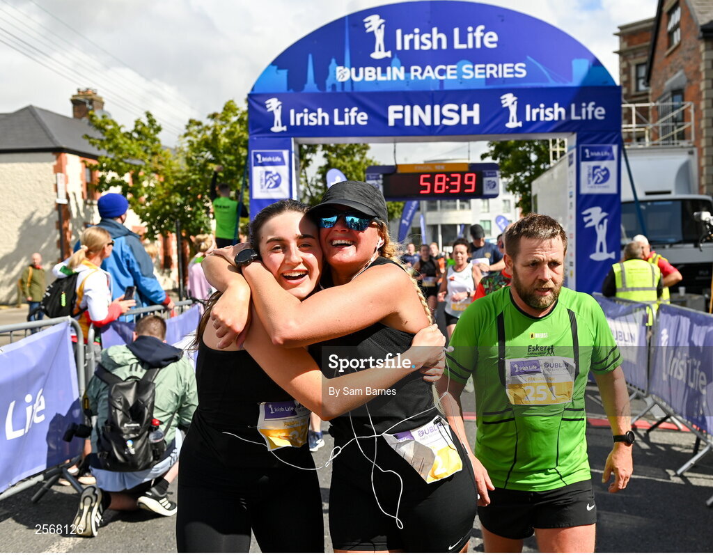 16 July 2023; Runners celebrate finishing the 2023 Irish Life Dublin Race Series-Fingal 10km which took place on Sunday 16th of July at Swords in Dublin. Photo by Sam Barnes/Sportsfile