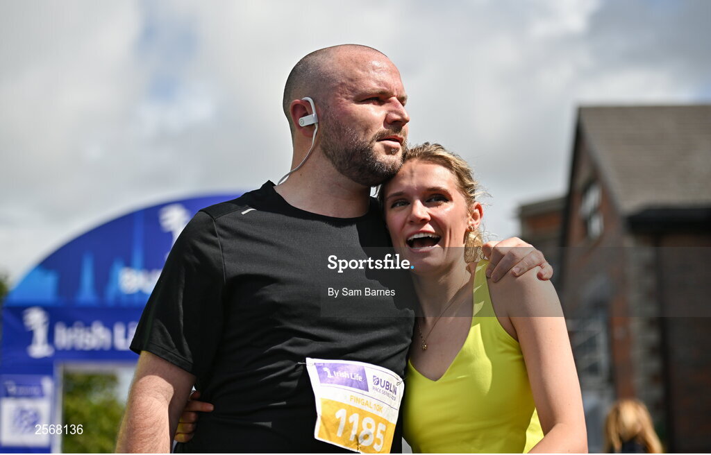 16 July 2023; Cian Gaffney and Leah Edwards celebrate finishing the 2023 Irish Life Dublin Race Series-Fingal 10km which took place on Sunday 16th of July at Swords in Dublin. Photo by Sam Barnes/Sportsfile