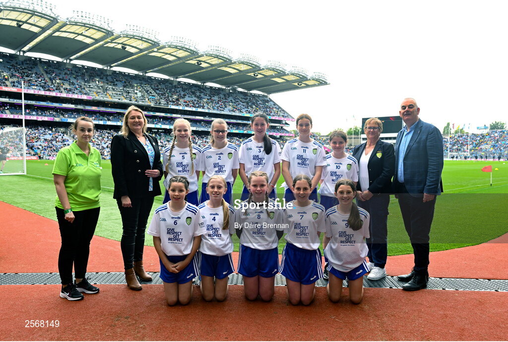 15 July 2023; The Monaghan team, back row, left to right, Nell Kinsella, Glandore NS, Glandore, Cork, Emily Nic an tSaoir, Gaelscoil Eoghain Uí Thuairisc, Carlow, Aoife Rodgers, St Brigid's NS, Bailieborough, Cavan, Lily May Queally, Scoil Naom Gobnait, Dungarvan, Waterford, Lara McAleer, St. Mary's PS, Cabragh, Tyrone, front row, left to right, Ava Flaherty, Spa NS, Tralee, Kerry, Michela Moynihan, Ovens NS, Ovens, Cork, Ella Wall, Clerihan NS, Clonmel, Tipperary, Maebh Browne, Hollyford NS, Hollyford, Tipperary, Cara McVeigh, Laghey PS, Dungannon, Tyrone, with GAA Safeguarding Officer Michelle Harte, LGFA Leinster President Trina Murray, Cumann na mBunscol President Mairéad O'Callaghan, and INTO CEO John Boyle, ahead of the INTO Cumann na mBunscol GAA Respect Exhibition Go Games at the GAA Football All-Ireland Senior Championship semi-final match between Dublin and Monaghan at Croke Park in Dublin. Photo by Daire Brennan/Sportsfile