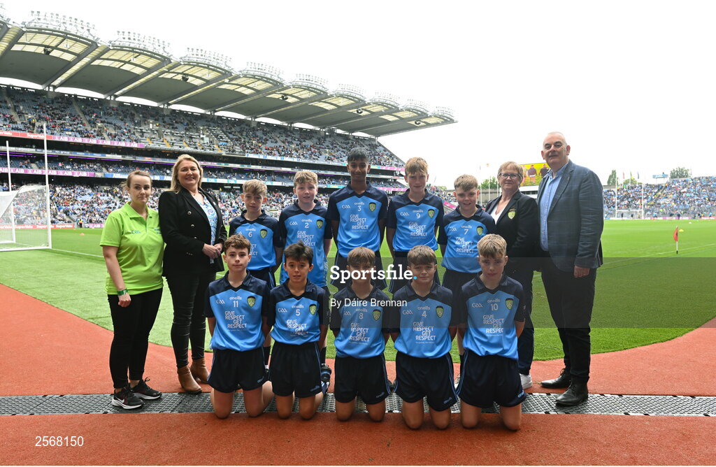 15 July 2023; The Dublin team, back row, left to right, Ben Lenihan, Dromcollogher NS, Charleville, Cork, Mike Funston, Enniskillen Integrated PS, Fermanagh, Richard Christie, St John the Apostle, Knockanacarra, Galway, Cillian Reilly, St John's NS, Castlebar, Mayo, TJ Flynn Reilly, Melview NS, Melview, Longford, front row, left to right, Harry Maguire, Kilmessan NS, Kilmessan, Meath, Jake Norris, Piltown NS, Piltown, Kilkenny, Fionn McCormack Crowe, St Mary's NS, Drumlish, Longford, Ryan O'Rourke, St Brendan's BNS, Loughrea, Galway, Jack 0'Toole, St Joseph's PS, Ballinrobe, Mayo, with GAA Safeguarding Officer Michelle Harte, LGFA Leinster President Trina Murray, Cumann na mBunscol President Mairéad O'Callaghan, and INTO CEO John Boyle, ahead of the INTO Cumann na mBunscol GAA Respect Exhibition Go Games at the GAA Football All-Ireland Senior Championship semi-final match between Dublin and Monaghan at Croke Park in Dublin. Photo by Daire Brennan/Sportsfile