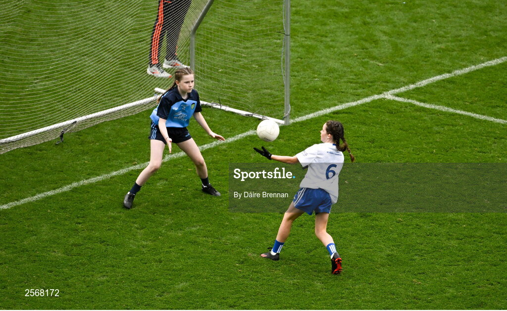 15 July 2023; Michela Moynihan, Ovens NS, Ovens, Cork, representing Monaghan, in action against Deirbhile McNabb, St Mary's PS, Tempo, Fermanagh, representing Dublin, during the GAA Respect Exhibition Go Games at the GAA Football All-Ireland Senior Championship semi-final match between Dublin and Monaghan at Croke Park in Dublin. Photo by Daire Brennan/Sportsfile