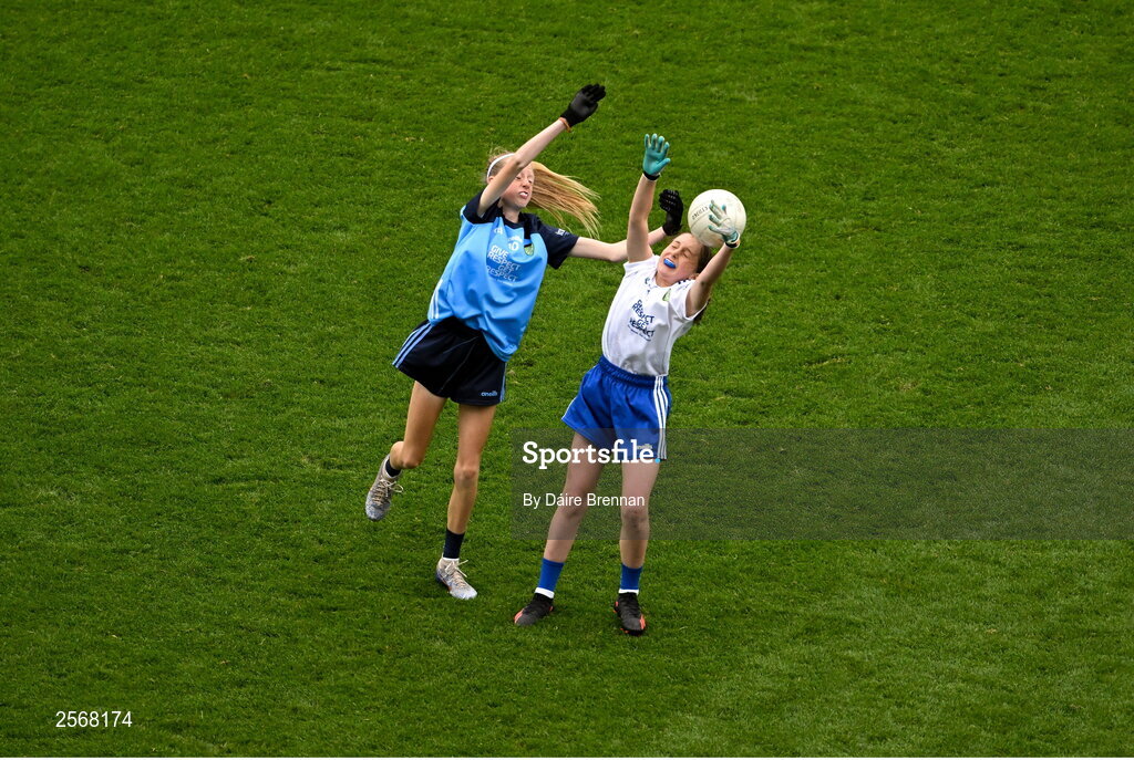 15 July 2023; Maebh Browne, Hollyford NS, Hollyford, Tipperary, representing Monaghan, in action against Ava Moll Lyons, Bornacoola NS, Carrick-on-Shannon, Leitrim, representing Dublin, during the GAA Respect Exhibition Go Games at the GAA Football All-Ireland Senior Championship semi-final match between Dublin and Monaghan at Croke Park in Dublin. Photo by Daire Brennan/Sportsfile