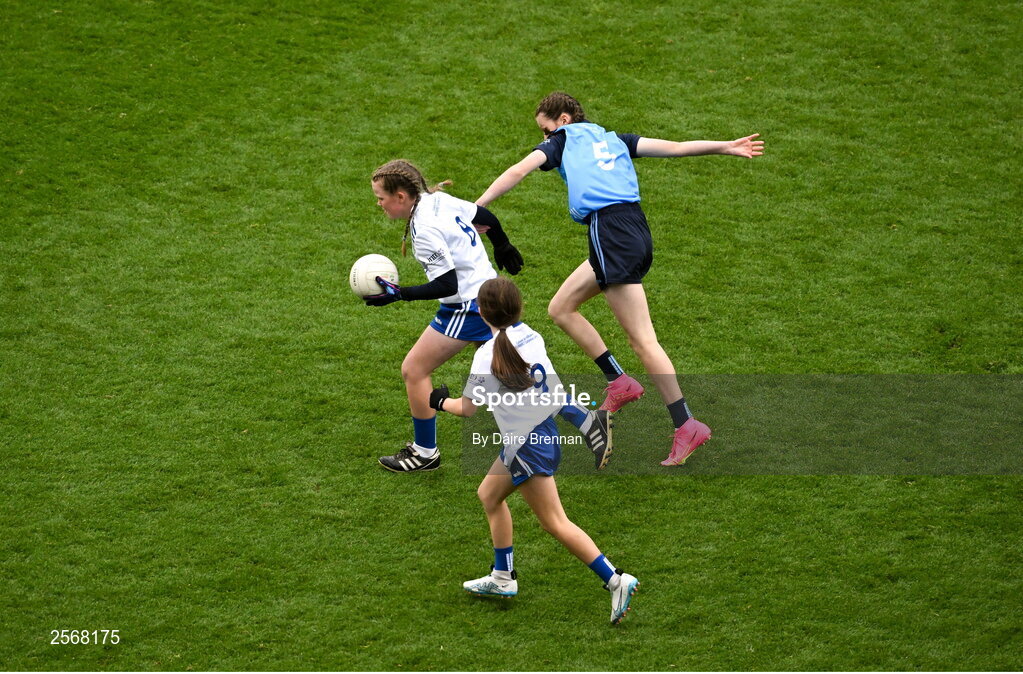 15 July 2023; Ella Wall, Clerihan NS, Clonmel, Tipperary, representing Monaghan, in action against Ella Rochford, Scoil Chile Chriost, Rathmore, Kildare, representing Dublin, during the GAA Respect Exhibition Go Games at the GAA Football All-Ireland Senior Championship semi-final match between Dublin and Monaghan at Croke Park in Dublin. Photo by Daire Brennan/Sportsfile