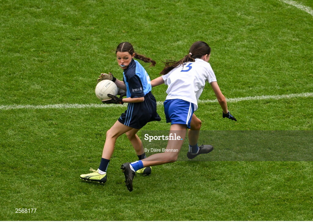 15 July 2023; Abigail Kerin, Scoil Mhuire na Trocaire, Ardee, Louth, representing Dublin, in action against Aoife Rodgers, St Brigid's NS, Bailieborough, Cavan, representing Monaghan, during the GAA Respect Exhibition Go Games at the GAA Football All-Ireland Senior Championship semi-final match between Dublin and Monaghan at Croke Park in Dublin. Photo by Daire Brennan/Sportsfile