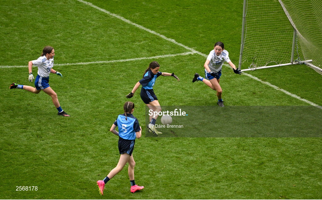 15 July 2023; Abigail Kerin, Scoil Mhuire na Trocaire, Ardee, Louth, representing Dublin, in action against Aoife Rodgers, St Brigid's NS, Bailieborough, Cavan, representing Monaghan, during the GAA Respect Exhibition Go Games at the GAA Football All-Ireland Senior Championship semi-final match between Dublin and Monaghan at Croke Park in Dublin. Photo by Daire Brennan/Sportsfile