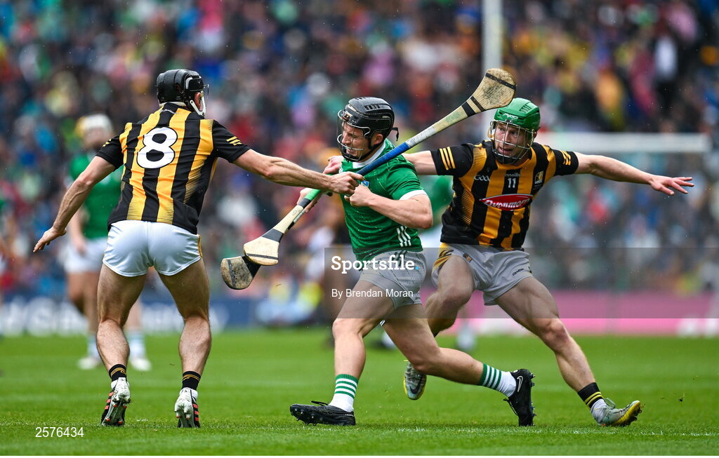 23 July 2023; Peter Casey of Limerick is tackled by Conor Fogarty, left, and Martin Keoghan of Kilkenny during the GAA Hurling All-Ireland Senior Championship final match between Kilkenny and Limerick at Croke Park in Dublin. Photo by Brendan Moran/Sportsfile
