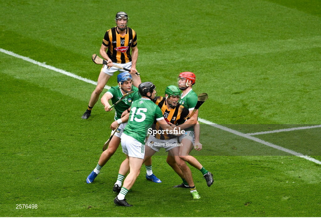 23 July 2023; Eoin Cody of Kilkenny in action against Limerick players, from left to right, Mike Casey, Peter Casey, and Barry Nash during the GAA Hurling All-Ireland Senior Championship final match between Kilkenny and Limerick at Croke Park in Dublin. Photo by Daire Brennan/Sportsfile