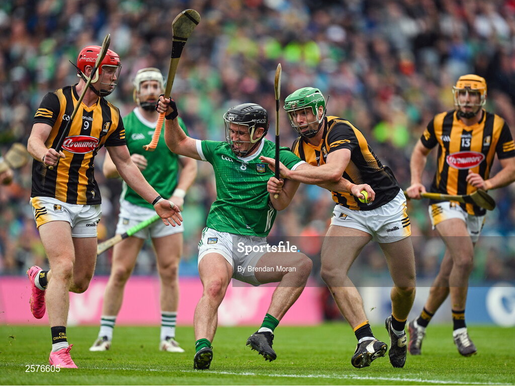 23 July 2023; Darragh O'Donovan of Limerick is tackled by  Adrian Mullen and Tommy Walsh during the GAA Hurling All-Ireland Senior Championship final match between Kilkenny and Limerick at Croke Park in Dublin. Photo by Brendan Moran/Sportsfile