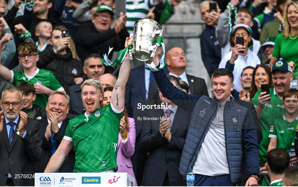 23 July 2023; Limerick players Cian Lynch, left, and Declan Hannon lift the Liam MacCarthy Cup after his side's victory in the GAA Hurling All-Ireland Senior Championship final match between Kilkenny and Limerick at Croke Park in Dublin. Photo by Brendan Moran/Sportsfile