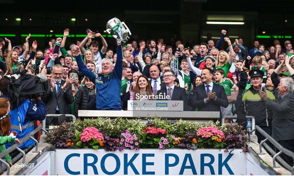 23 July 2023; Limerick manager John Kiely lifts the Liam MacCarthy Cup after his side's victory in the GAA Hurling All-Ireland Senior Championship final match between Kilkenny and Limerick at Croke Park in Dublin. Photo by Ramsey Cardy/Sportsfile