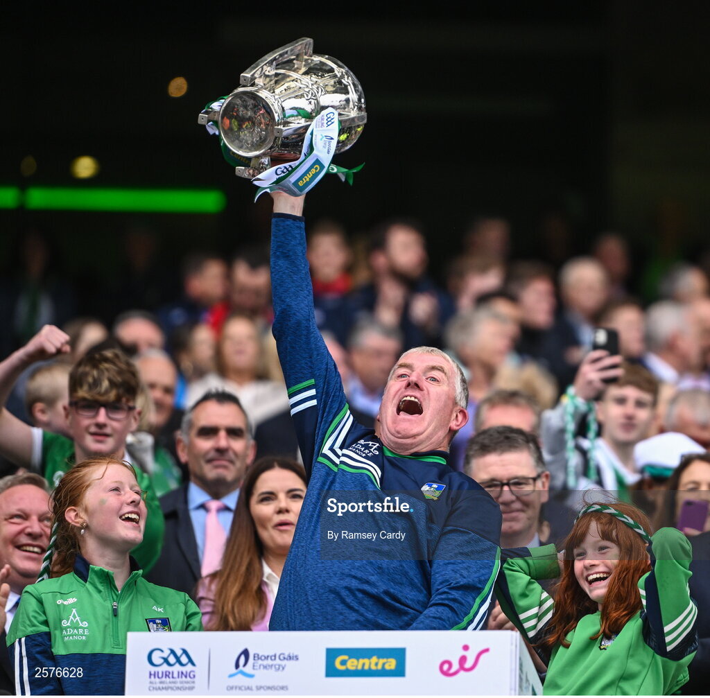 23 July 2023; Limerick manager John Kiely lifts the Liam MacCarthy Cup after his side's victory in the GAA Hurling All-Ireland Senior Championship final match between Kilkenny and Limerick at Croke Park in Dublin. Photo by Ramsey Cardy/Sportsfile