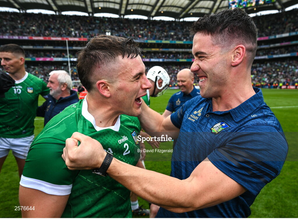23 July 2023; Mike Casey of Limerick celebrates with his teammate Sean Finn after the GAA Hurling All-Ireland Senior Championship final match between Kilkenny and Limerick at Croke Park in Dublin. Photo by David Fitzgerald/Sportsfile