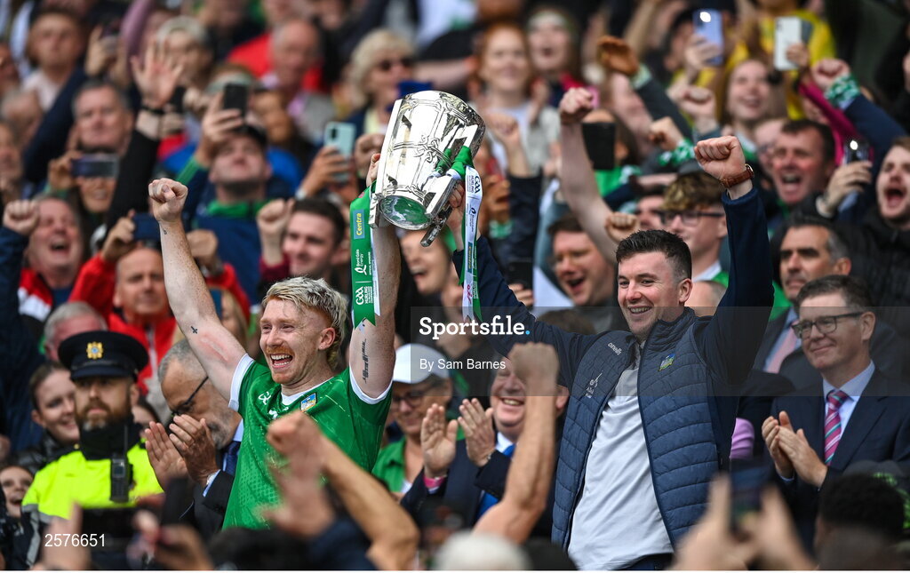 23 July 2023; Limerick players Cian Lynch, left, and Declan Hannon lift the Liam MacCarthy after his side's victory in the GAA Hurling All-Ireland Senior Championship final match between Kilkenny and Limerick at Croke Park in Dublin. Photo by Sam Barnes/Sportsfile