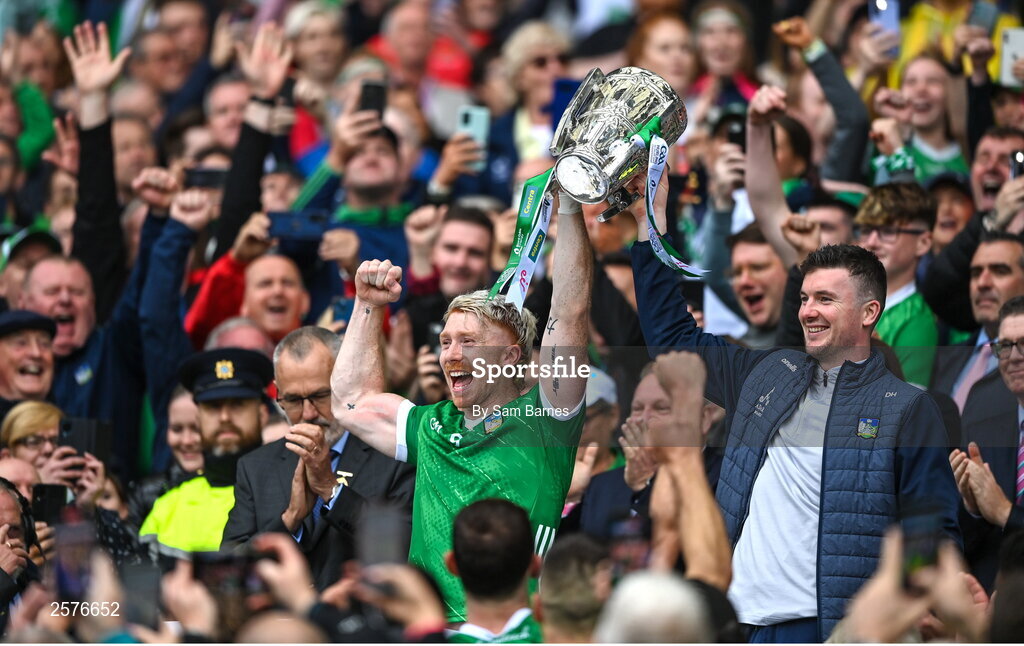 23 July 2023; Limerick players Cian Lynch, left, and Declan Hannon lift the Liam MacCarthy after his side's victory in the GAA Hurling All-Ireland Senior Championship final match between Kilkenny and Limerick at Croke Park in Dublin. Photo by Sam Barnes/Sportsfile