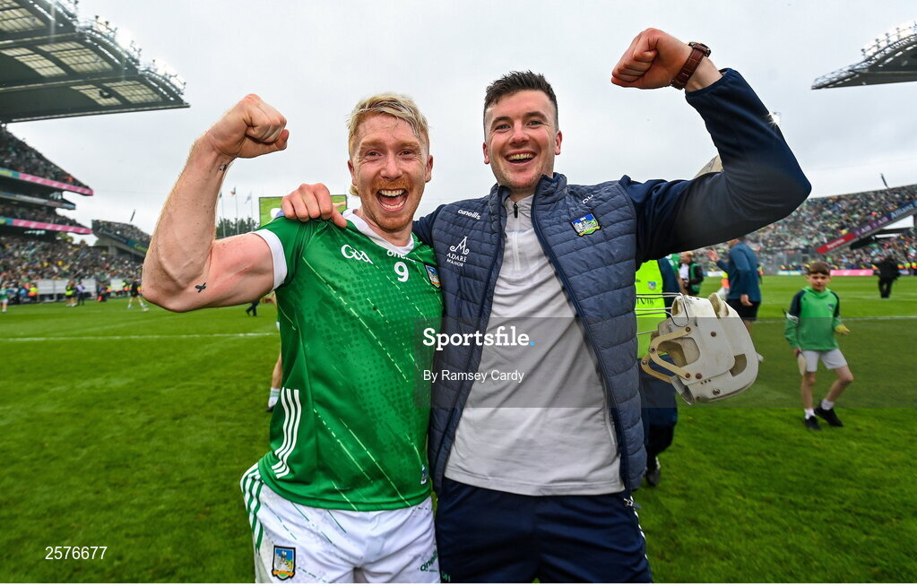 23 July 2023; Cian Lynch of Limerick celebrates with injured Limerick captain Declan Hannon after the GAA Hurling All-Ireland Senior Championship final match between Kilkenny and Limerick at Croke Park in Dublin. Photo by Ramsey Cardy/Sportsfile