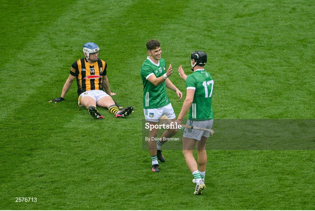 23 July 2023; Limerick players Aaron Costello, left, and Conor Boylan, celebrate near a dejected TJ Reid of Kilkenny after the GAA Hurling All-Ireland Senior Championship final match between Kilkenny and Limerick at Croke Park in Dublin. Photo by Daire Brennan/Sportsfile