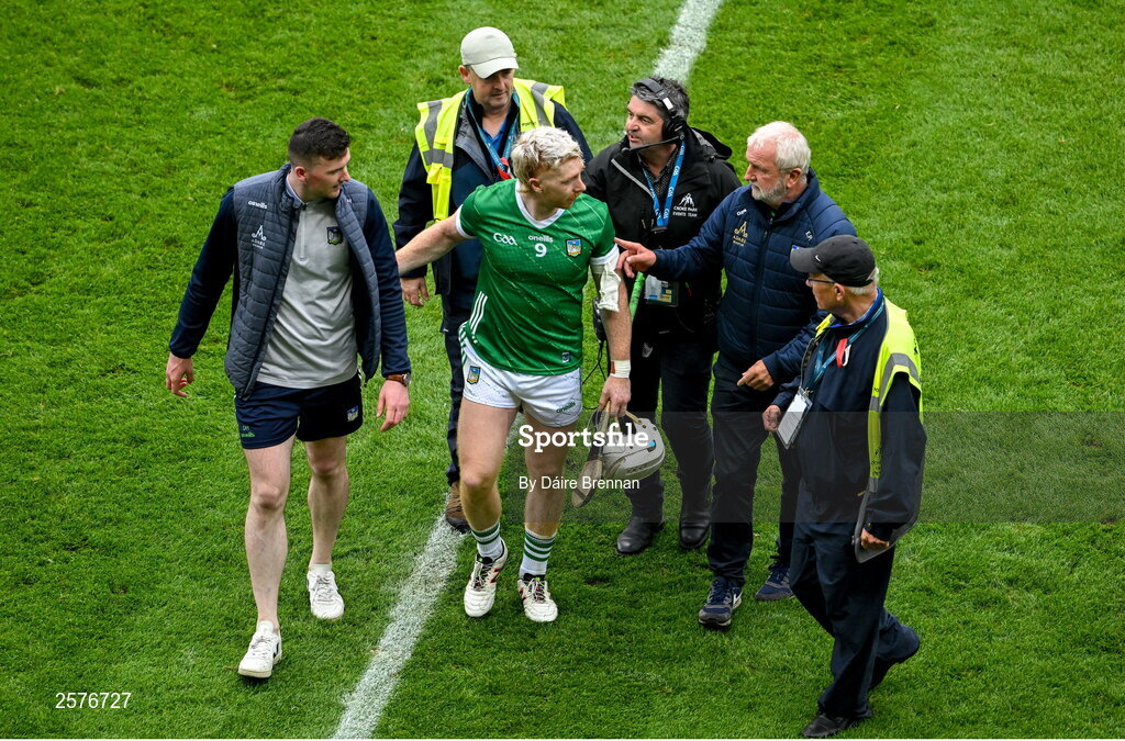 23 July 2023; GAA officials guide Limerick captain Cian Lynch, along with Declan Hannon towards the Hogan Stand for the cup presentation after the GAA Hurling All-Ireland Senior Championship final match between Kilkenny and Limerick at Croke Park in Dublin. Photo by Daire Brennan/Sportsfile