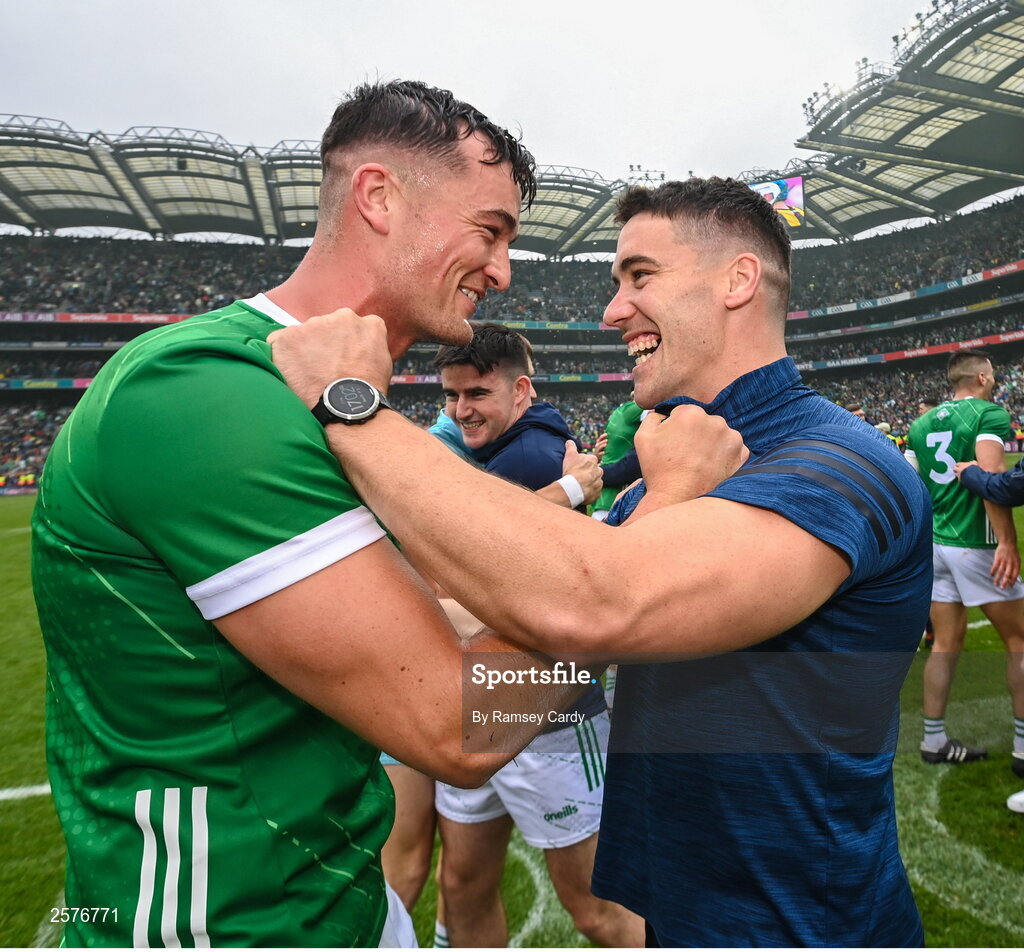 23 July 2023; Kyle Hayes of Limerick, left, celebrates with Injured Limerick hurler Seán Finn after the GAA Hurling All-Ireland Senior Championship final match between Kilkenny and Limerick at Croke Park in Dublin. Photo by Ramsey Cardy/Sportsfile