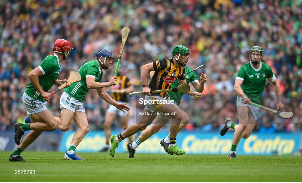 23 July 2023; Eoin Cody of Kilkenny breaks away from Limerick players during the GAA Hurling All-Ireland Senior Championship final match between Kilkenny and Limerick at Croke Park in Dublin. Photo by David Fitzgerald/Sportsfile