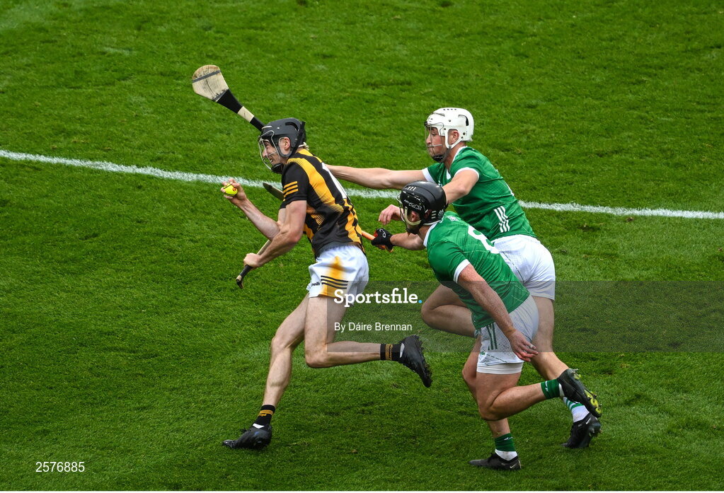 23 July 2023; Tom Phelan of Kilkenny in action against Darragh O'Donovan, left, and Kyle Hayes of Limerick  during the GAA Hurling All-Ireland Senior Championship final match between Kilkenny and Limerick at Croke Park in Dublin. Photo by Daire Brennan/Sportsfile