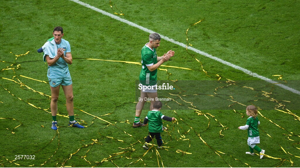 23 July 2023; Limerick players Graeme Mulcahy, right, and daughter Róise, and Nickie Quaid and his son Dáithí after the GAA Hurling All-Ireland Senior Championship final match between Kilkenny and Limerick at Croke Park in Dublin. Photo by Daire Brennan/Sportsfile