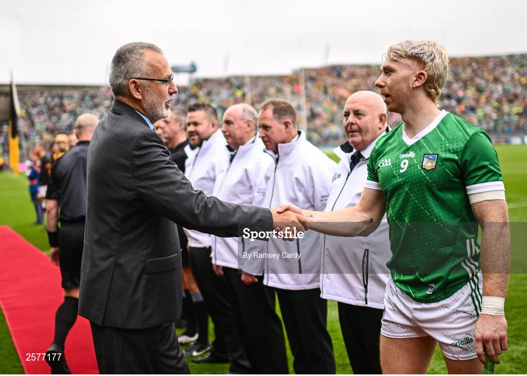 23 July 2023; Uachtarán Chumann Lúthchleas Gael Larry McCarthy is introduced to Limerick captain Cian Lynch before the GAA Hurling All-Ireland Senior Championship final match between Kilkenny and Limerick at Croke Park in Dublin. Photo by Ramsey Cardy/Sportsfile