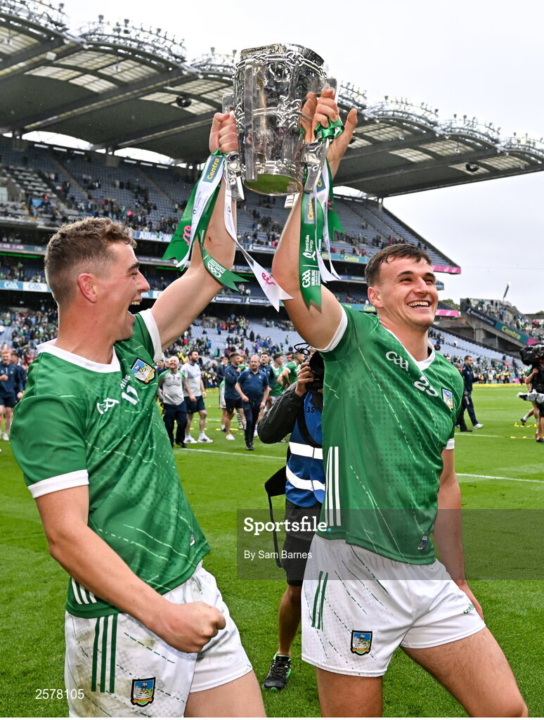 23 July 2023; David Reidy, left, and Cathal O'Neill of Limerick, celebrate with the cup after their side's victory in the GAA Hurling All-Ireland Senior Championship final match between Kilkenny and Limerick at Croke Park in Dublin. Photo by Sam Barnes/Sportsfile
