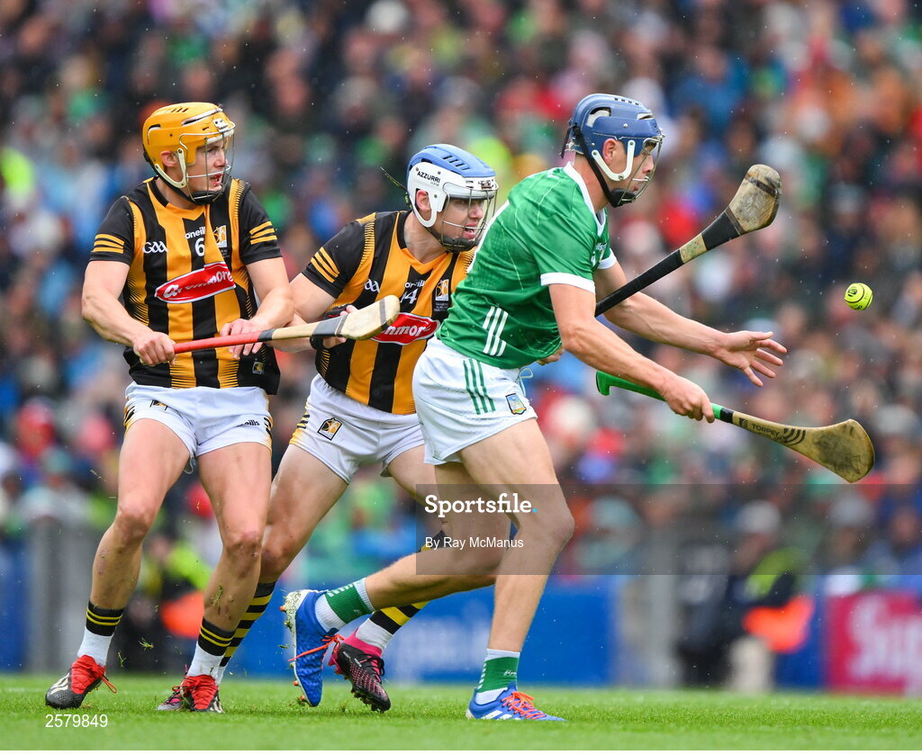 23 July 2023; David Reidy of Limerick is tackled by TJ Reid and Richie Reid of Kilkenny, left, during the GAA Hurling All-Ireland Senior Championship final match between Kilkenny and Limerick at Croke Park in Dublin. Photo by Ray McManus/Sportsfile