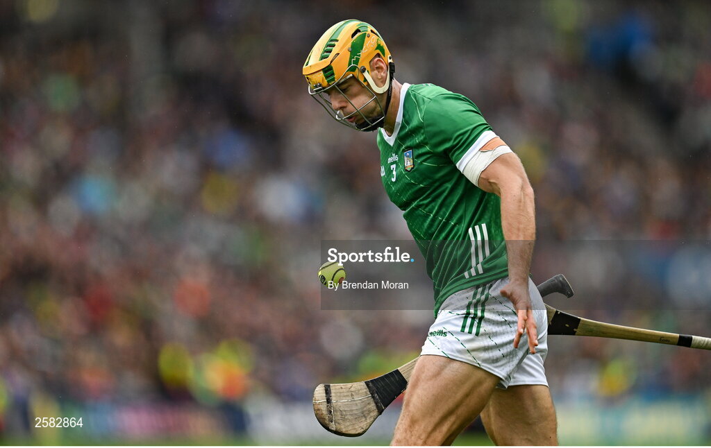 23 July 2023; Dan Morrissey of Limerick handpasses the sliotar during the GAA Hurling All-Ireland Senior Championship final match between Kilkenny and Limerick at Croke Park in Dublin. Photo by Brendan Moran/Sportsfile