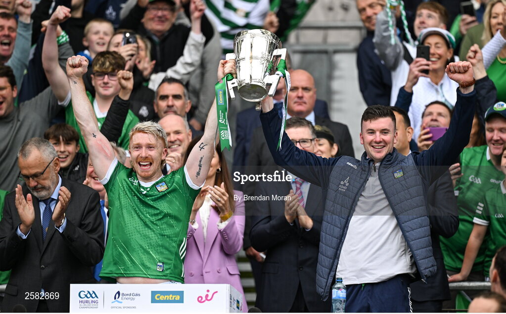 23 July 2023; Limerick playing captain Cian Lynch, left, and injured team captain Declan Hannon celebrate as they lift the Liam MacCarthy Cup aftr the GAA Hurling All-Ireland Senior Championship final match between Kilkenny and Limerick at Croke Park in Dublin. Photo by Brendan Moran/Sportsfile
