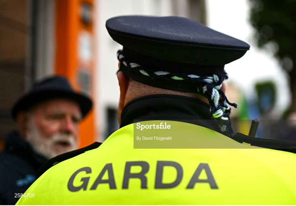 30 July 2023; A member of An Garda Síochána wearing a Dublin head band before the GAA Football All-Ireland Senior Championship final match between Dublin and Kerry at Croke Park in Dublin. Photo by David Fitzgerald/Sportsfile