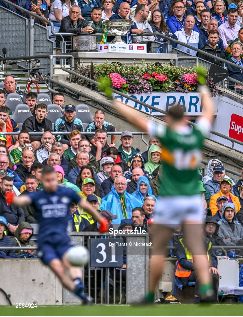 30 July 2023; The Sam Maguire Cup on display in the Hogan Stand as Dublin goalkeeper Stephen Cluxton score his side's first point, from a free, during the GAA Football All-Ireland Senior Championship final match between Dublin and Kerry at Croke Park in Dublin. Photo by Piaras Ó Mídheach/Sportsfile
