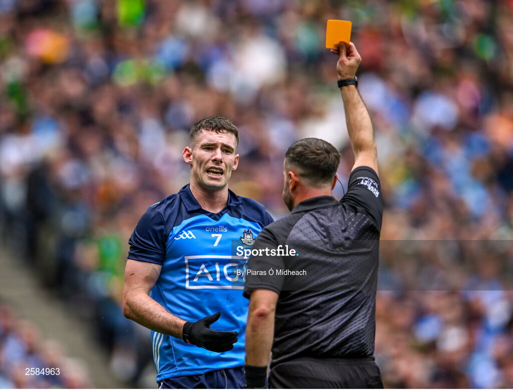 30 July 2023; Lee Gannon of Dublin is shown the yellow card by referee David Gough during the GAA Football All-Ireland Senior Championship final match between Dublin and Kerry at Croke Park in Dublin. Photo by Piaras Ó Mídheach/Sportsfile