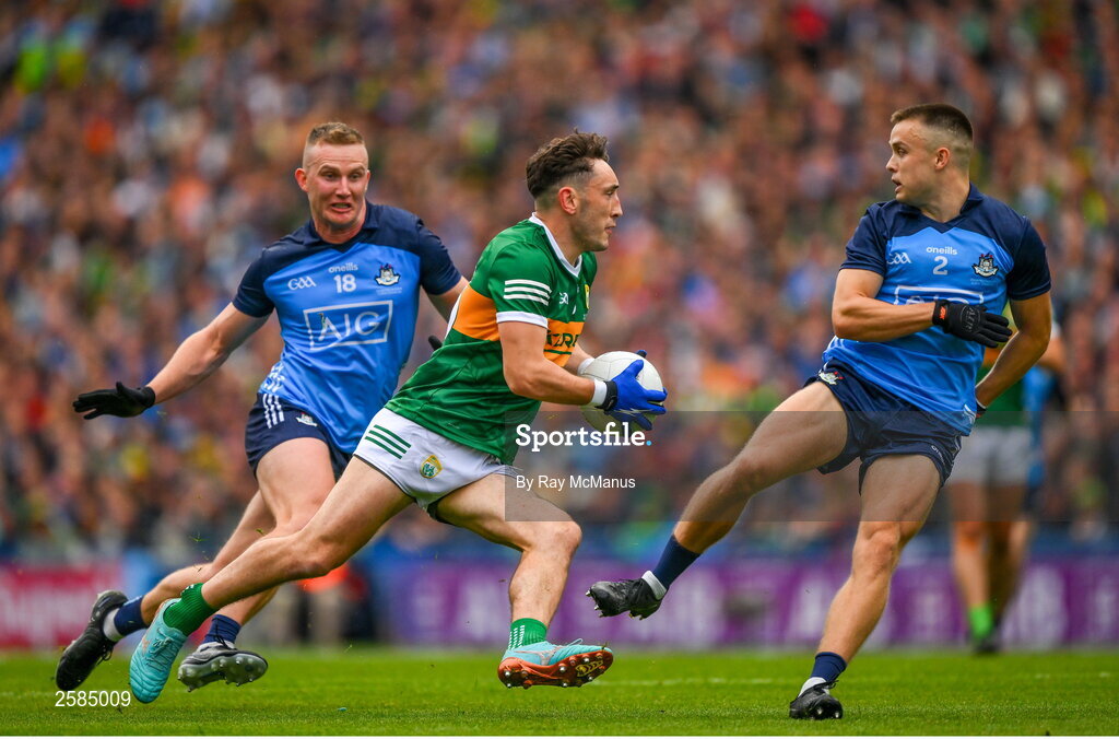 30 July 2023; Paudie Clifford of Kerry salips between Eoin Murchan and Ciaran Kilkenny of Dublin, left,  during the GAA Football All-Ireland Senior Championship final match between Dublin and Kerry at Croke Park in Dublin. Photo by Ray McManus/Sportsfile