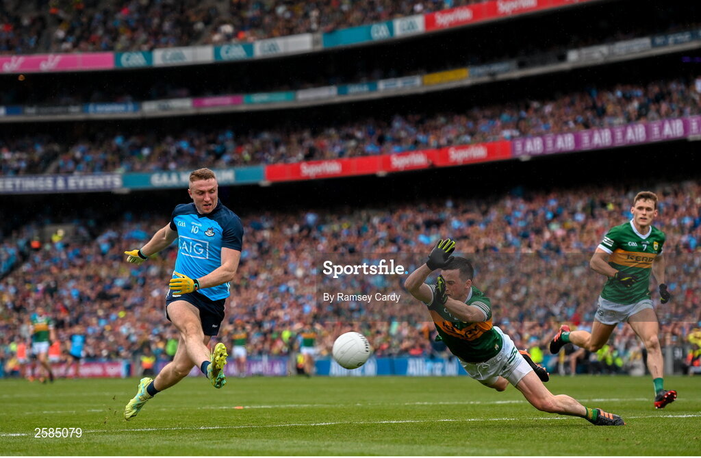 30 July 2023; Paddy Small of Dublin shoots to score his side's first goal despite the efforts of Paul Murphy of Kerry during the GAA Football All-Ireland Senior Championship final match between Dublin and Kerry at Croke Park in Dublin. Photo by Ramsey Cardy/Sportsfile